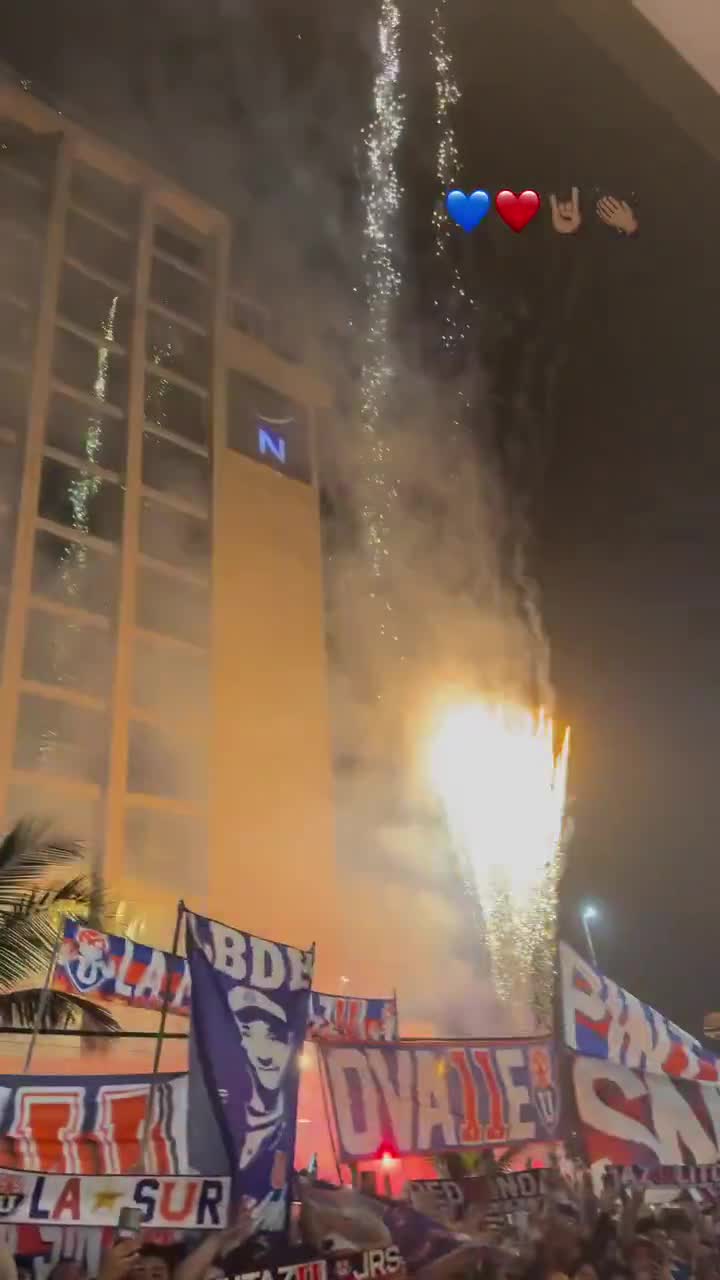 La U fans flood the streets of Rio and set off fireworks before the decisive match against Botafogo