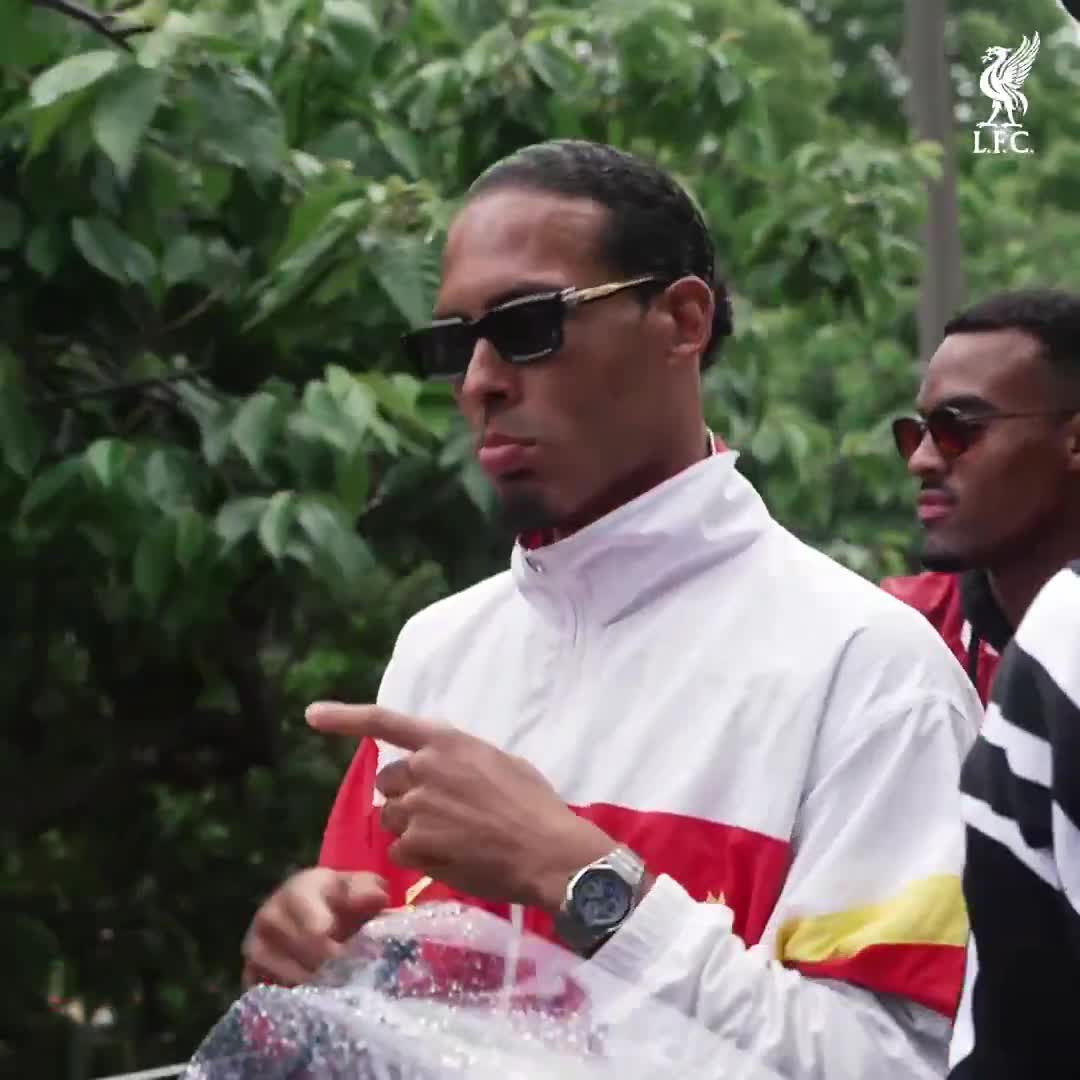 Van Dijk on the trophy parade is a vibe