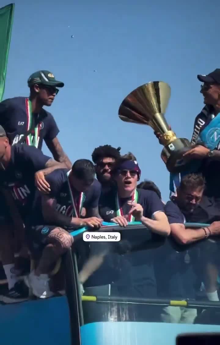 Scott McTominay and Napoli players celebrate the Serie A title with their fans.