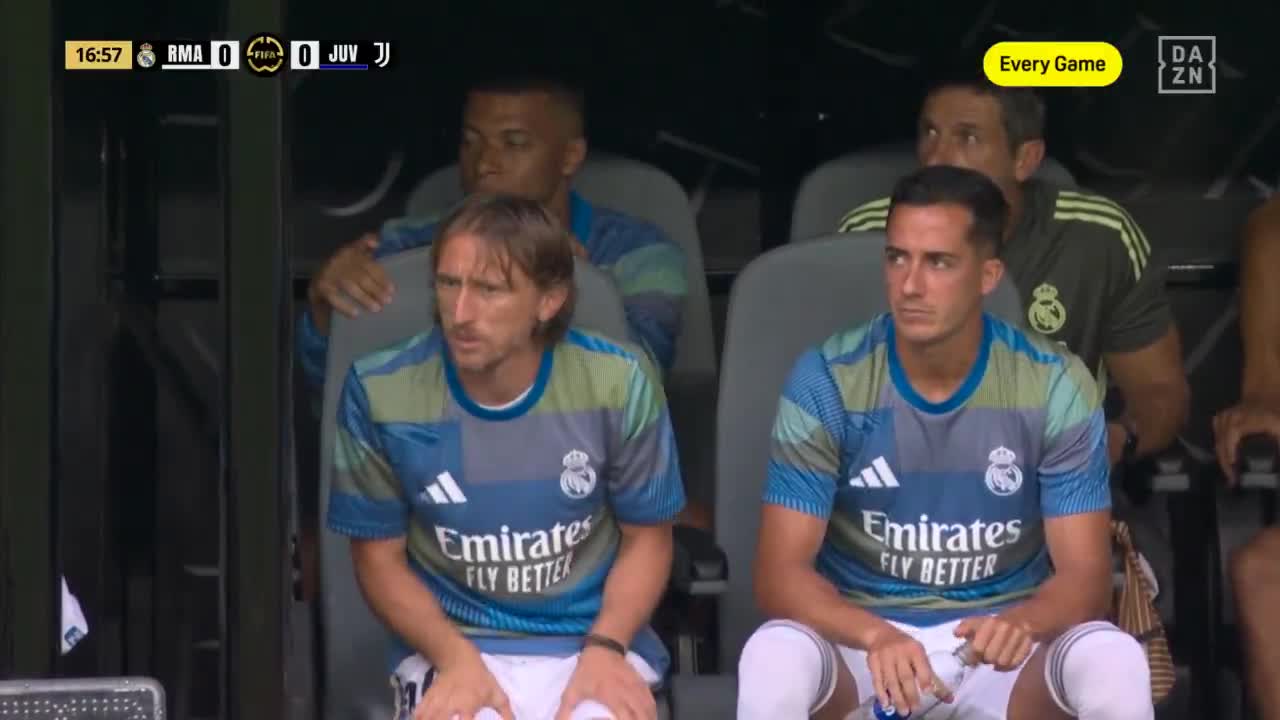Mbappé intently watches his teammates play from the bench
