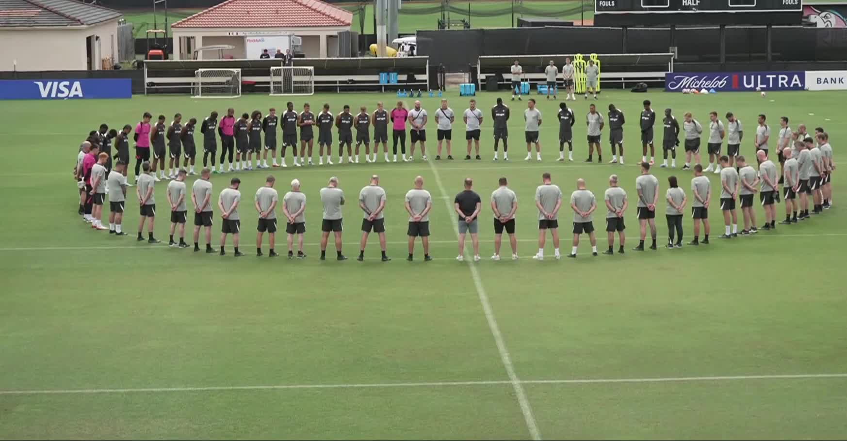 Chelsea Football Club players and staff gather to hold a minute silence for Diogo Jota and Andre Silva.