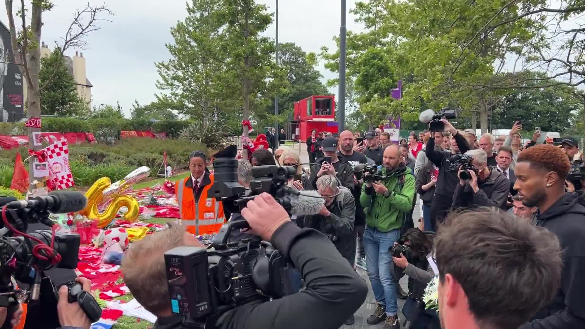 Representatives from Everton pay their respects to Diogo Jota at Anfield.