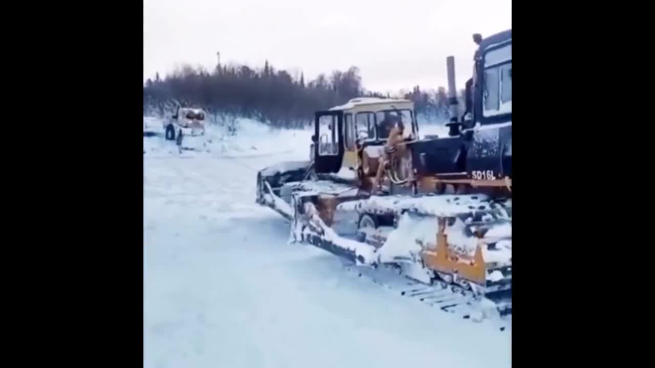 Driver Sinks To The Bottom Of A Frozen River With His Machine