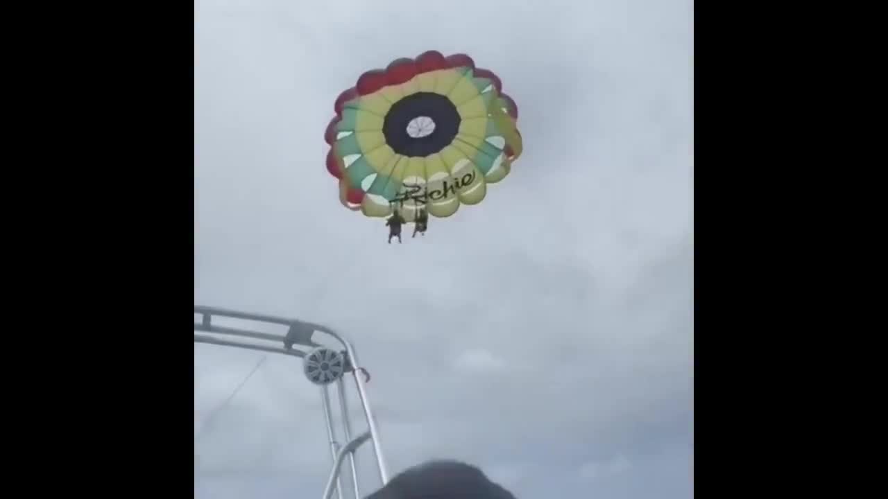 Couple Smashed Hard Into Beach After Parasailing Rope Snaps