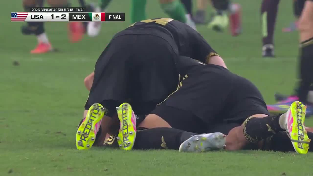 Mexico players celebrate after a 2-1 victory over the USA to win the Gold Cup title.