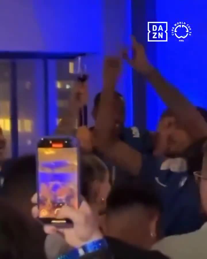 Chelsea players singing We Are the Champions