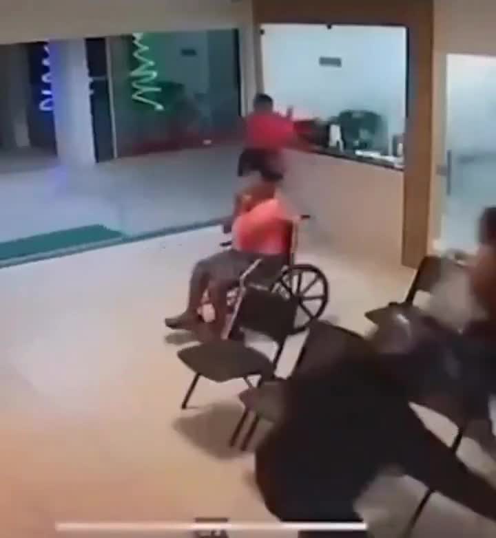 Crazy moment, shooting occurs, woman in wheelchair suddenly stands up and runs