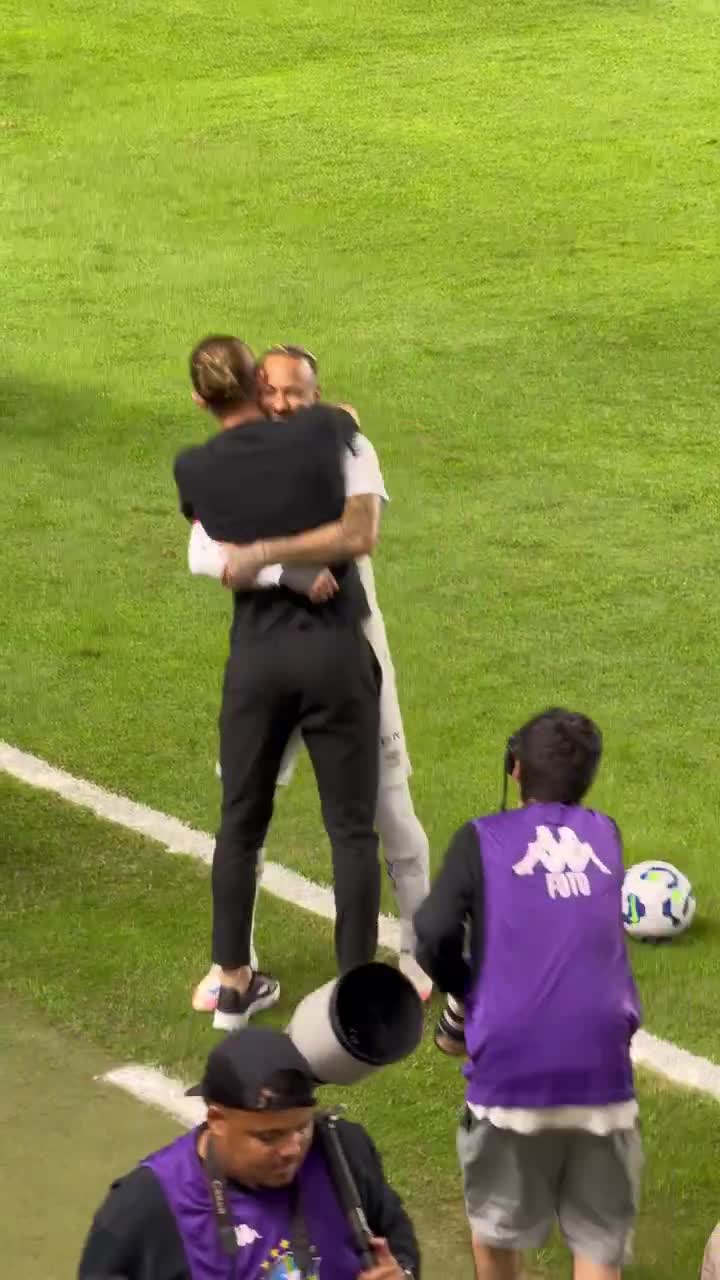Neymar playfully tries to nutmeg coach Filipe Luís during the Santos vs Flamengo match