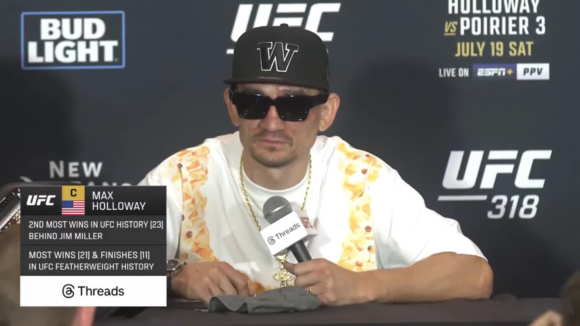 Max Holloway says it doesn’t make any sense for Ilia to be walking around with that BMF belt.