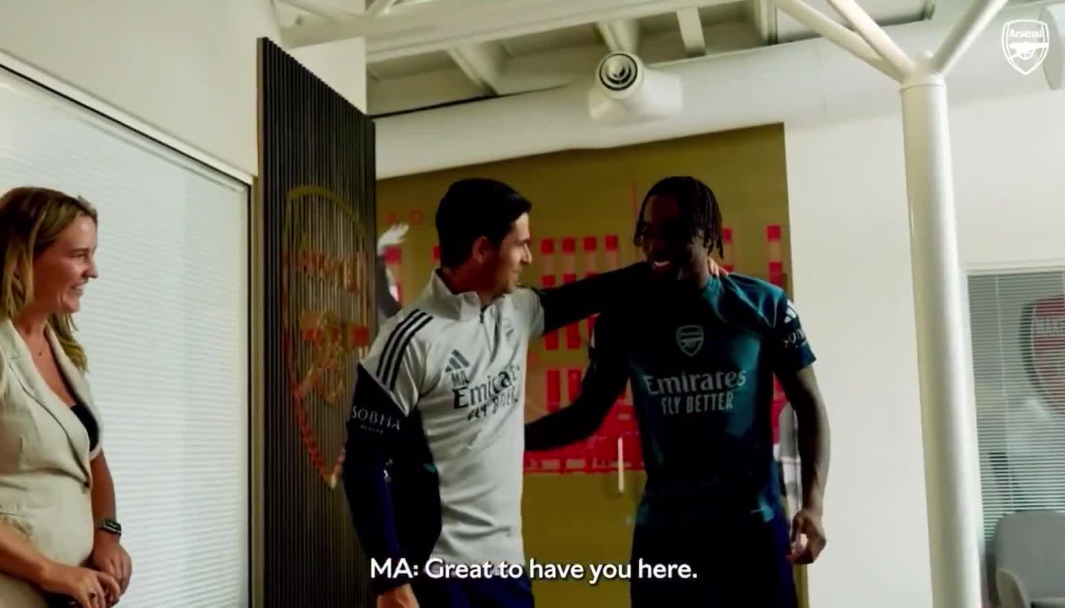 Mikel Arteta greeting Noni Madueke upon his arrival at Arsenal.