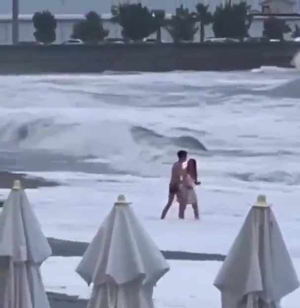 swept away by the waves