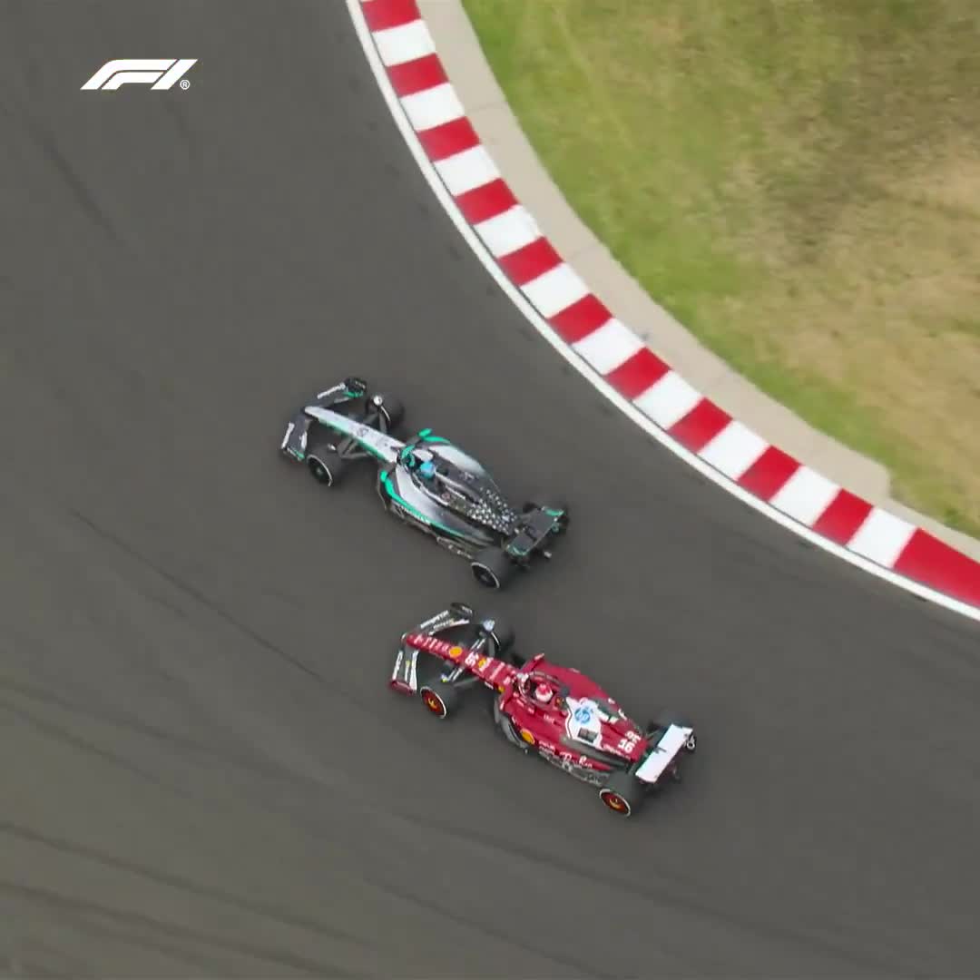 Russell overtakes Leclerc to claim a podium spot at the Hungarian GP.