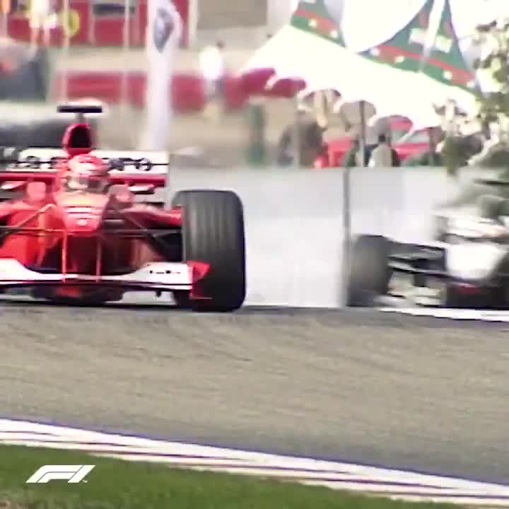 Mika Hakkinen overtakes Michael Schumacher while lapping Ricardo Zonta to take the lead and eventually win Belgian GP 2000