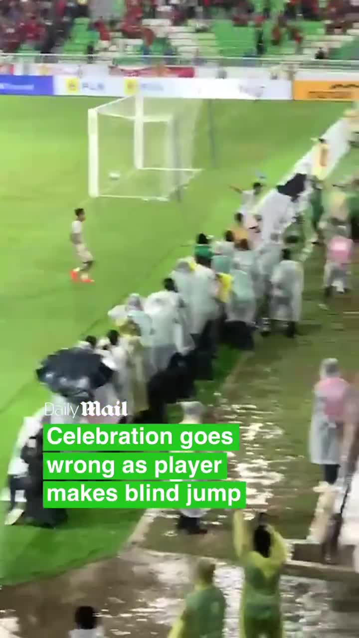 Celebrating player miraculously walks-away uninjured after making a blind jump