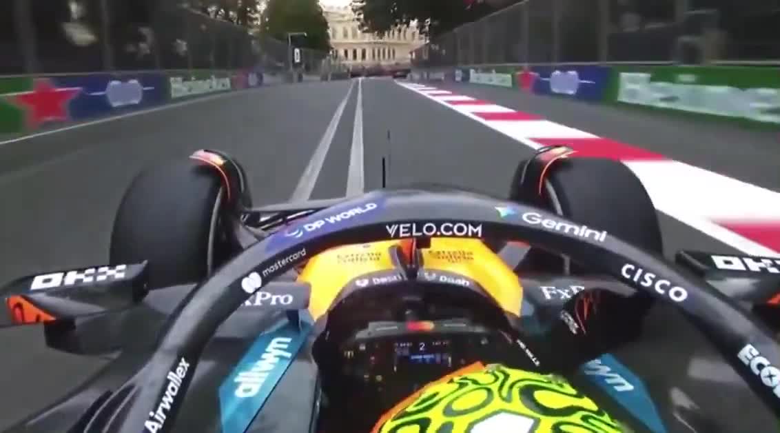 Lando congratulating Carlos on his podium after the race