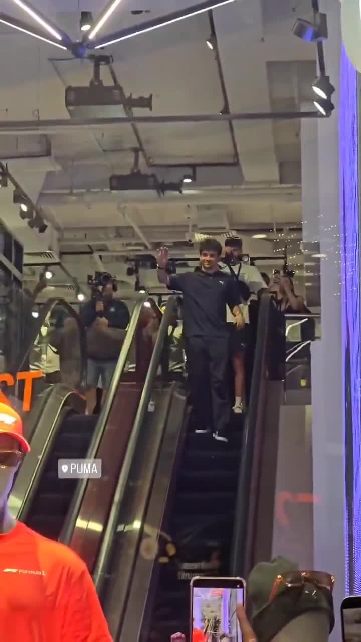 Fans welcome Charles Leclerc at the Puma Store in Singapore