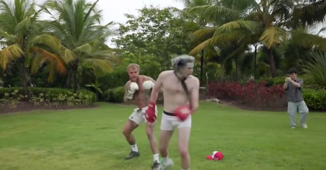 A random guy showed up to Logan Paul’s house asking to box him & Jake… and got brutally KO’d by both