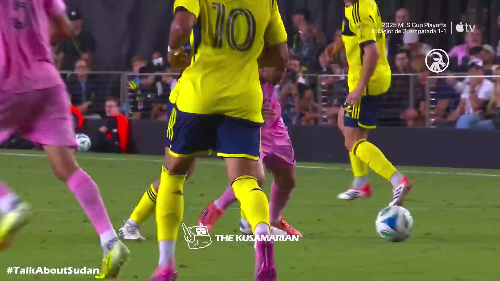 Messi nutmegs a Nashville player.