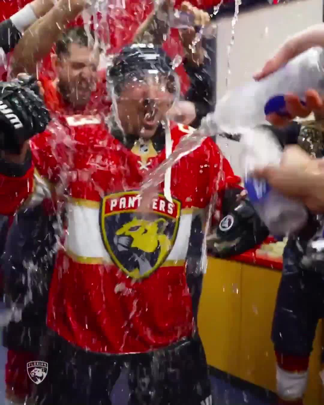 Brad Marchand and his teammates celebrate his 1,000 NHL points milestone.