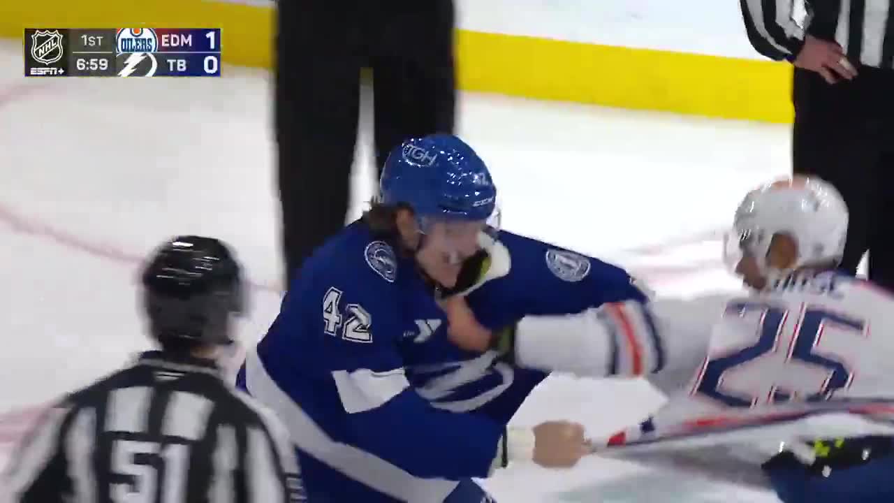 Douglas and Nurse drop the gloves after Douglas hit Walman