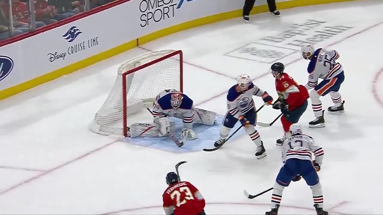 Reinhart stays an Oilers Killer with this INSANE backhanded mid air swing