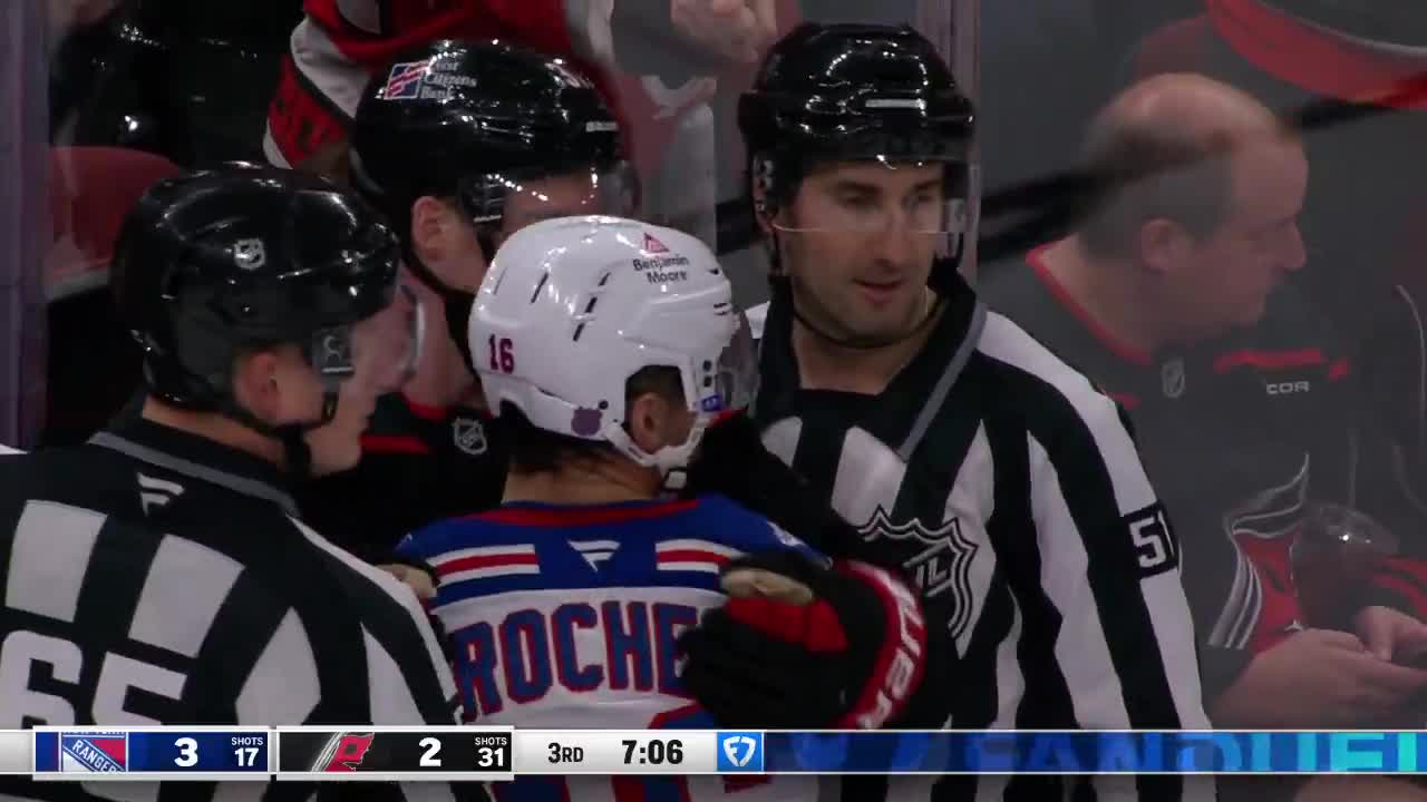 Svechnikov with a warm embrace of him ex teammate Vincent Trocheck