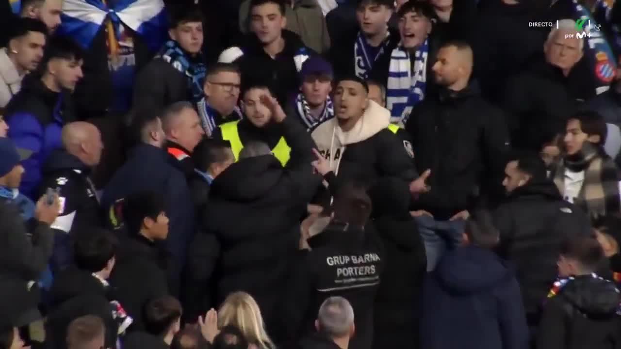 FC Barcelona fan celebrating among angry Espanyol fans