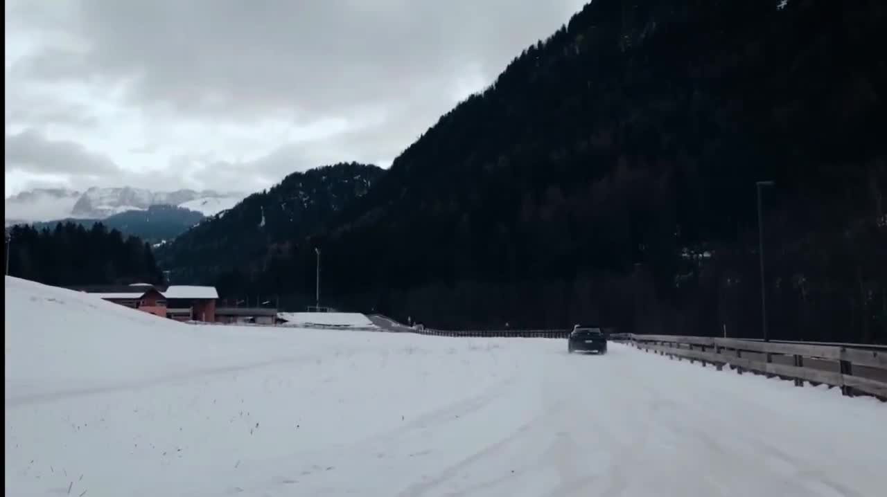 Charles doing some snow drifting with friends