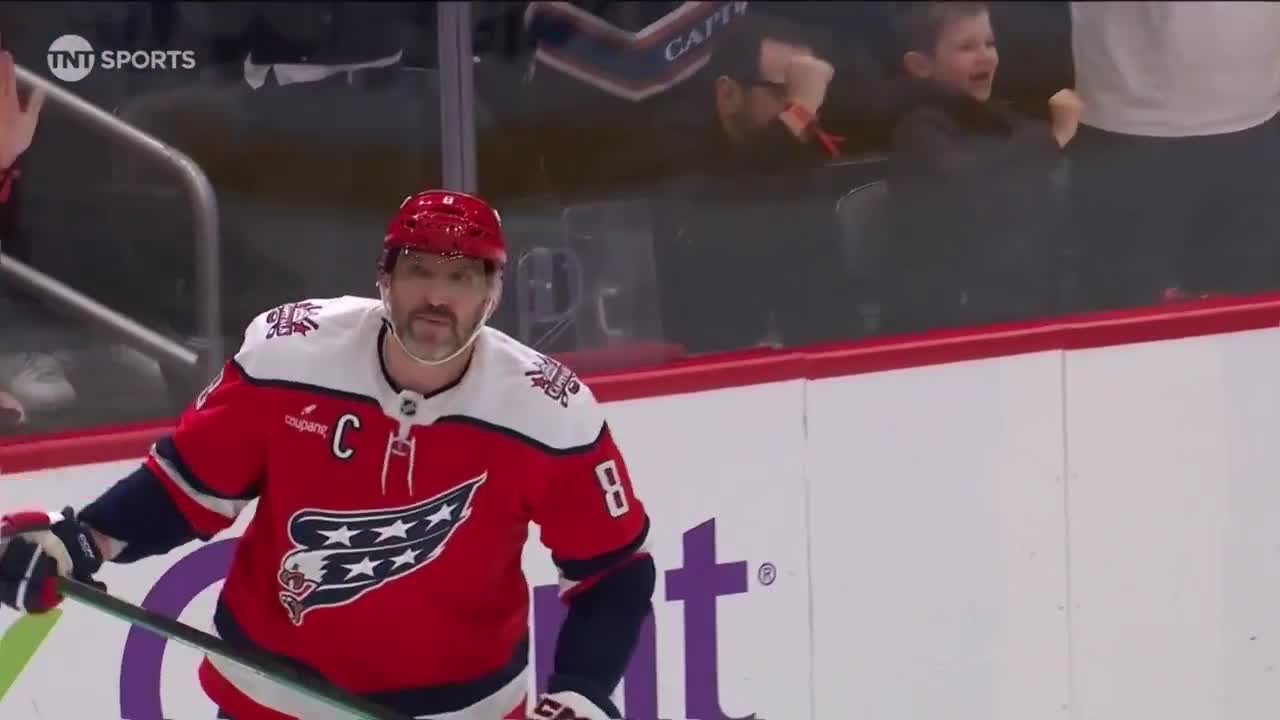 Ovi gives a knuckle touch to his son after scoring