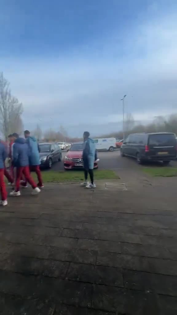 The Arsenal squad go on their pre-match walk around Nottingham before the game
