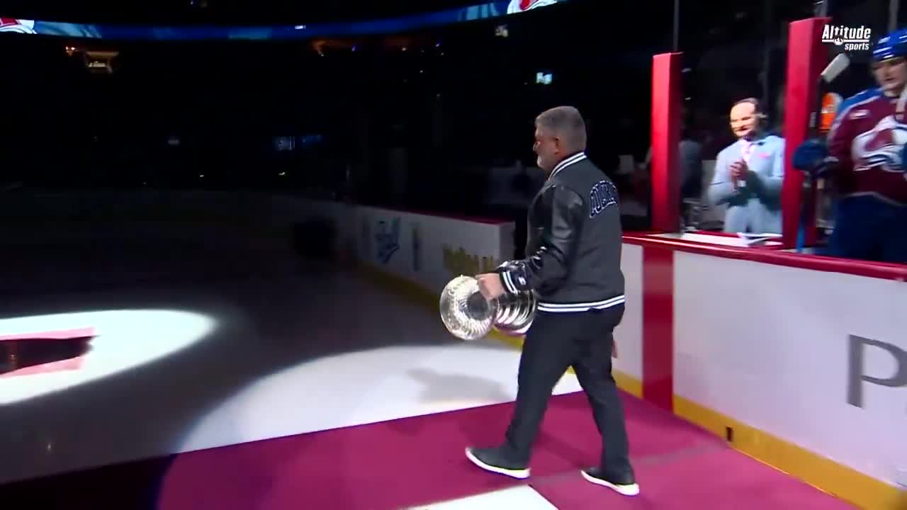 Ray Bourque lifting Lord Stanley once ag...