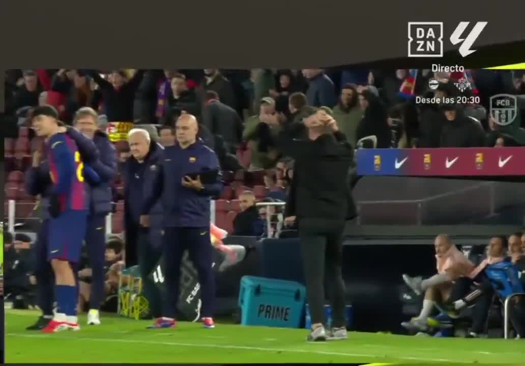 Hansi Flick and Marc Bernal's reaction to Lamine Yamal's goal.