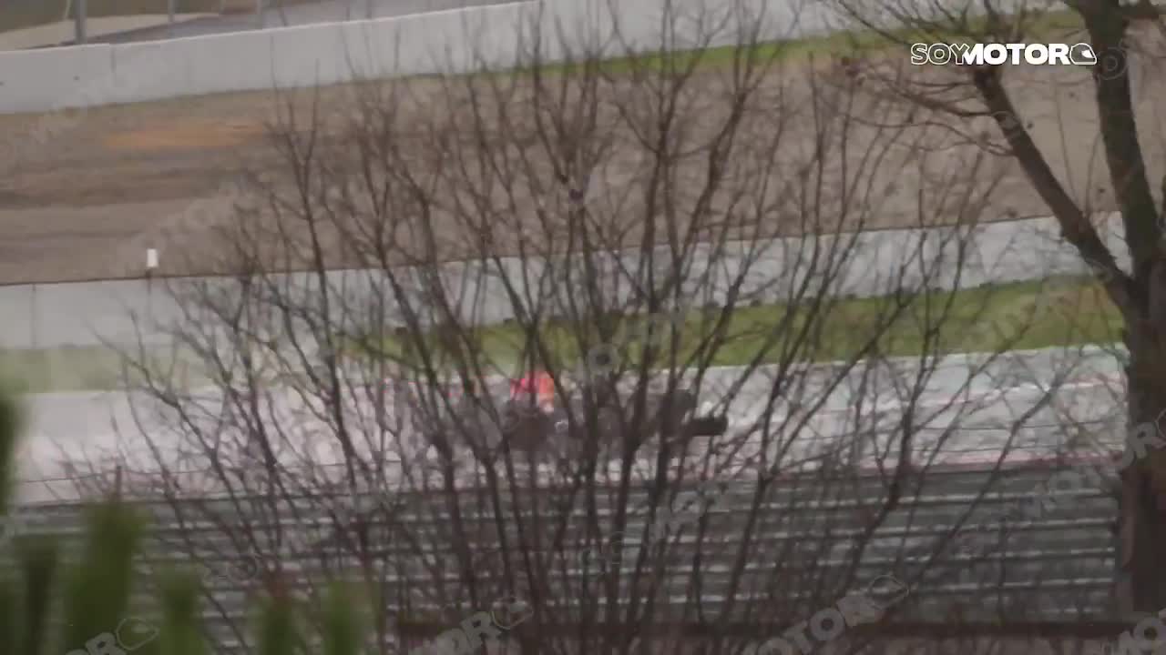 Max Verstappen driving the RB22 in wet c... (1)