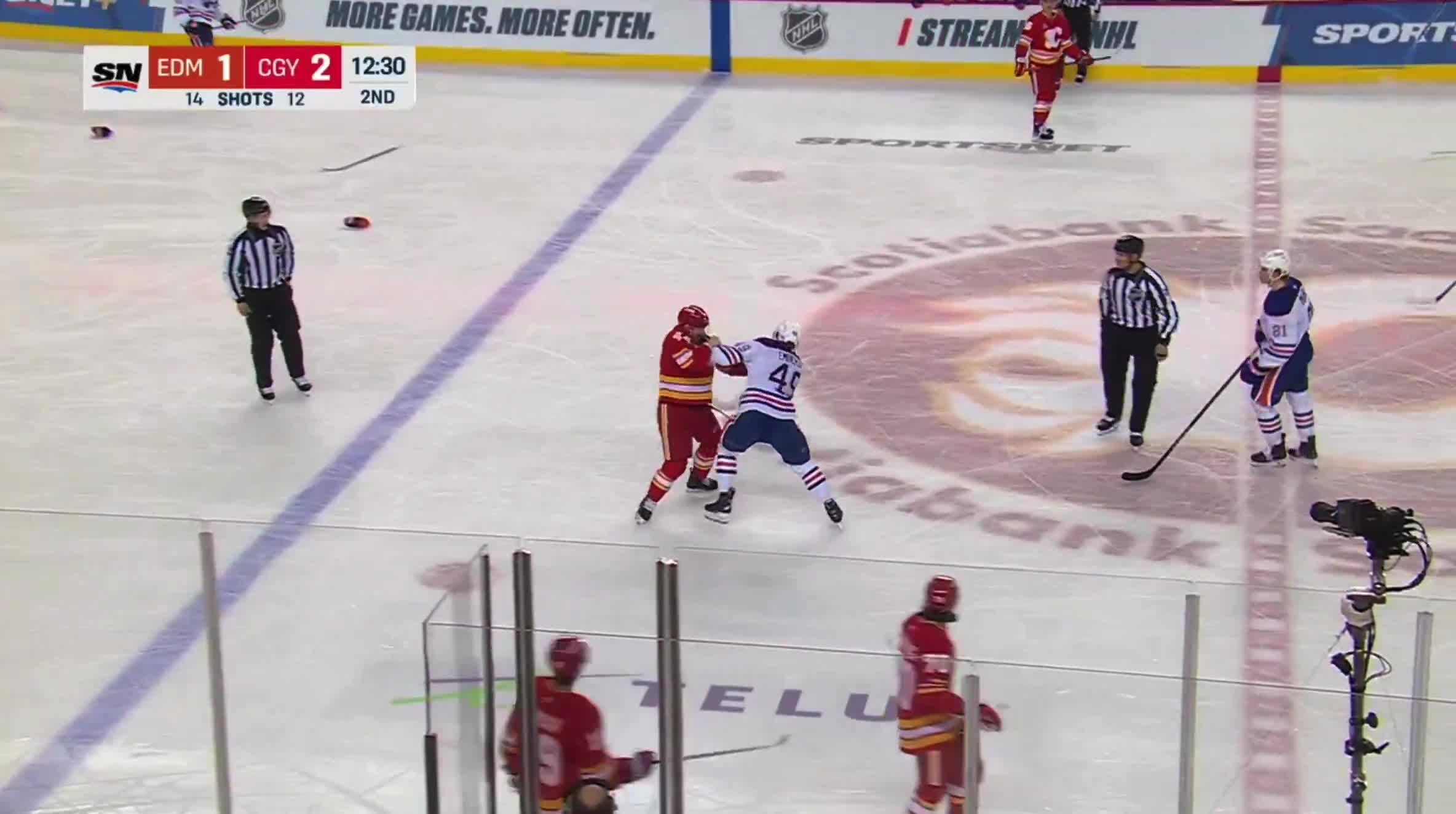 Joel Hanley and Ty Emberson exchange som...