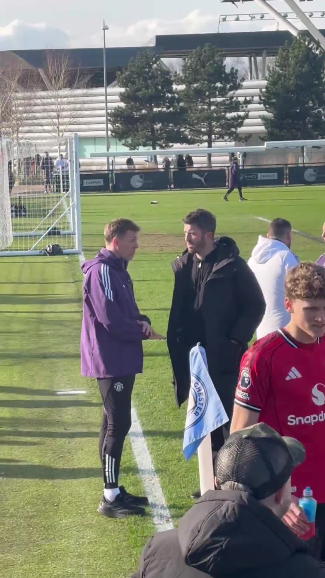 Michael Carrick and Darren Fletcher deep in conversation after the 3-1 Man United U18s derby win