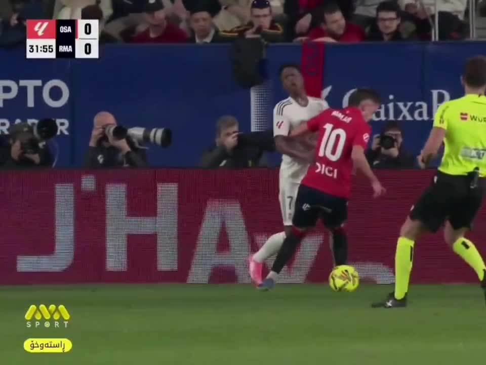 The Osasuna player gets booked after thi...