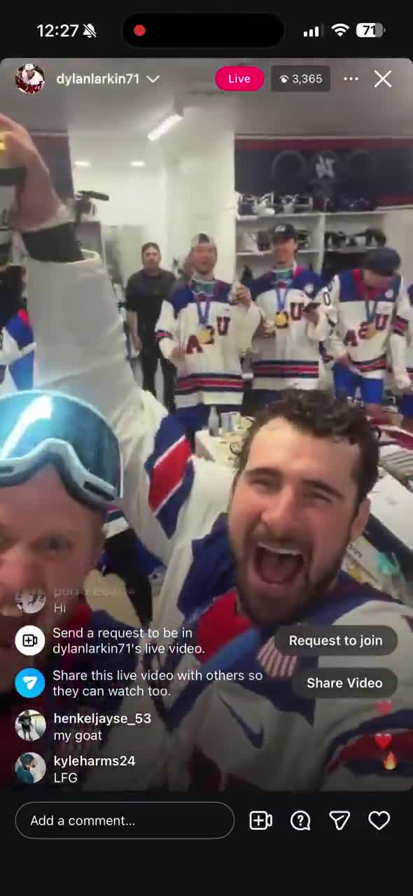 Dylan Larkin and Team USA celebrating wi...