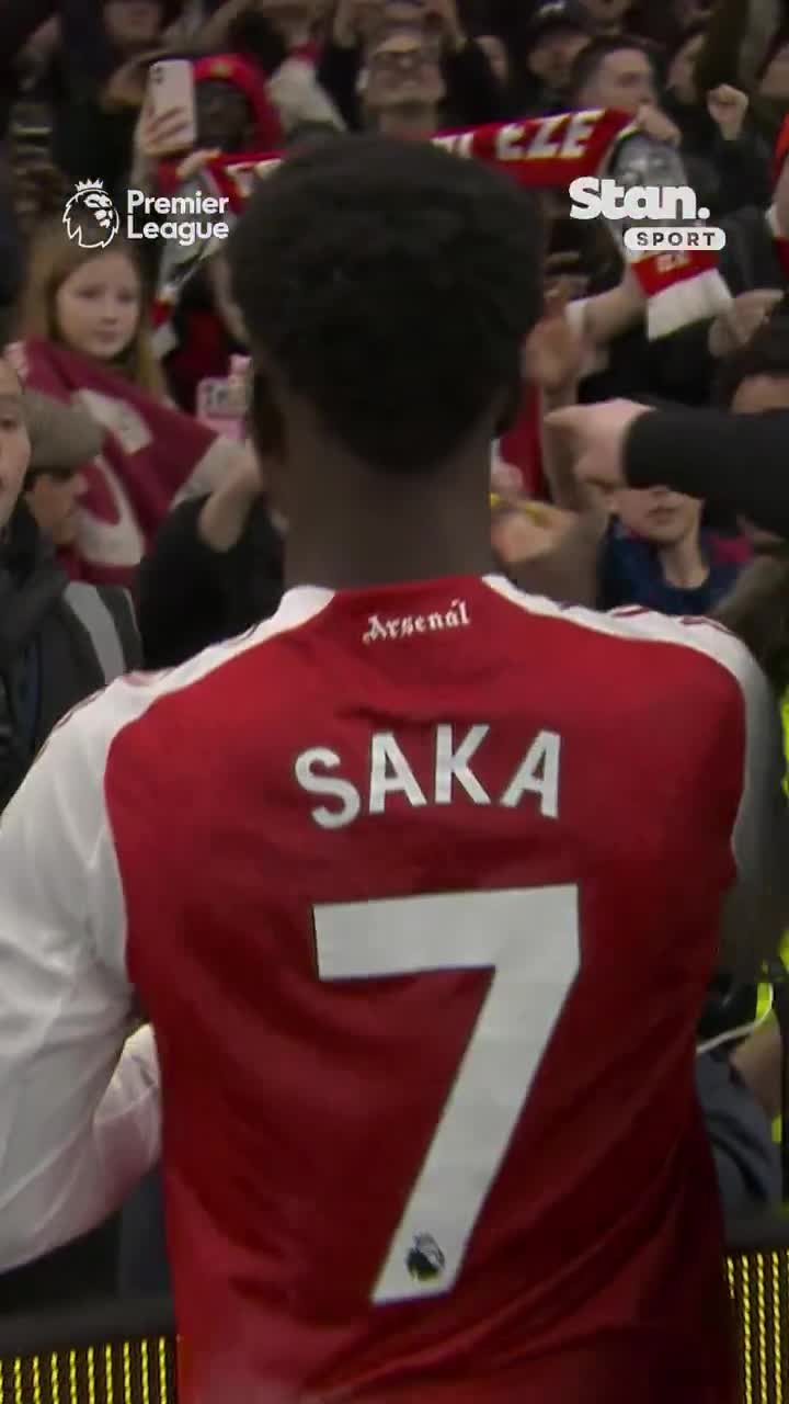 Bukayo saka gifting his boots to a young...