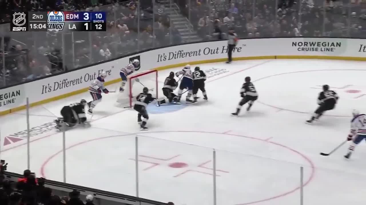 McDavid drags Kuemper WAYYYYYY OUT OF TH...
