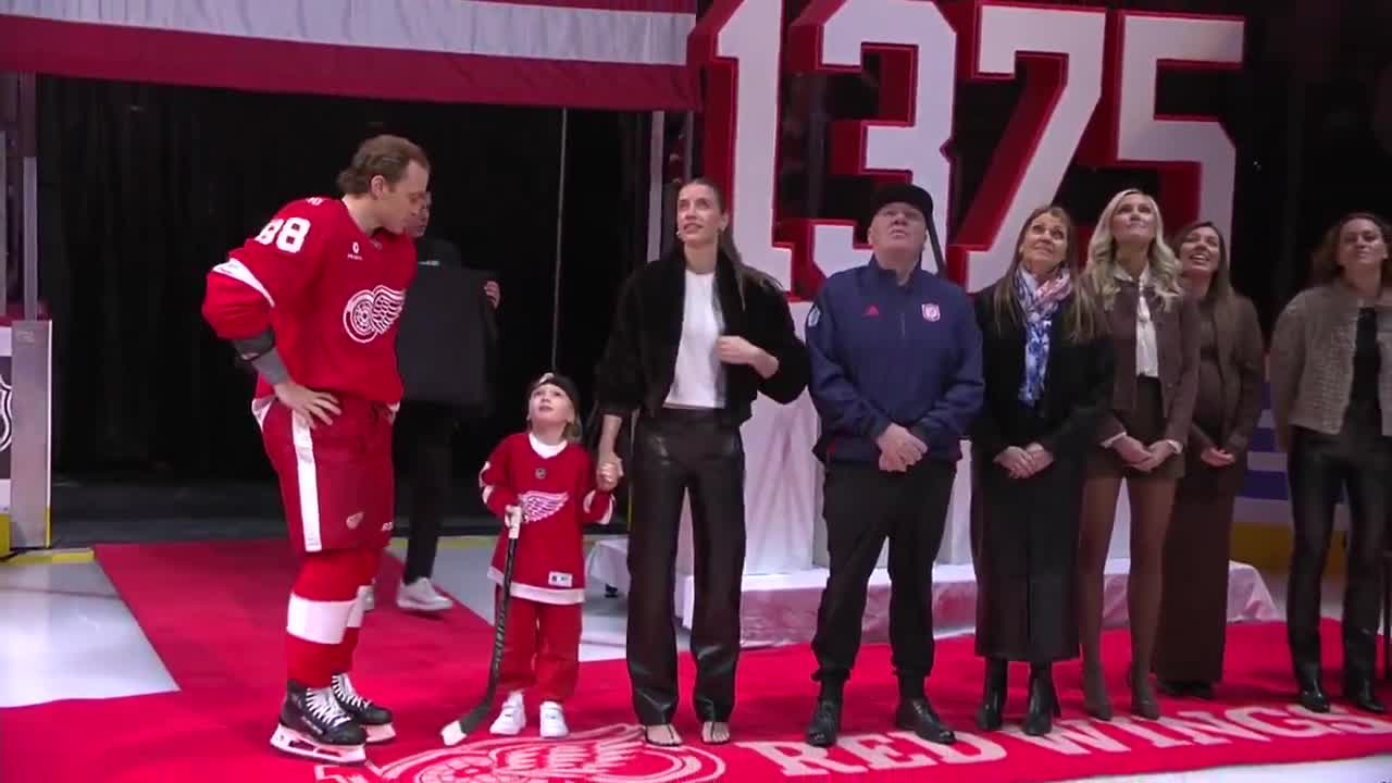 An emotional Patrick Kane watches his tr...