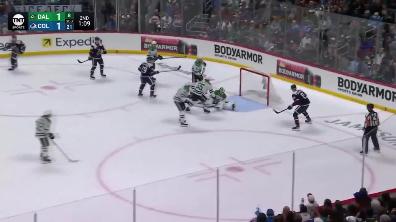 Jake Oettinger with a sleeve save point blank on MacKinnon