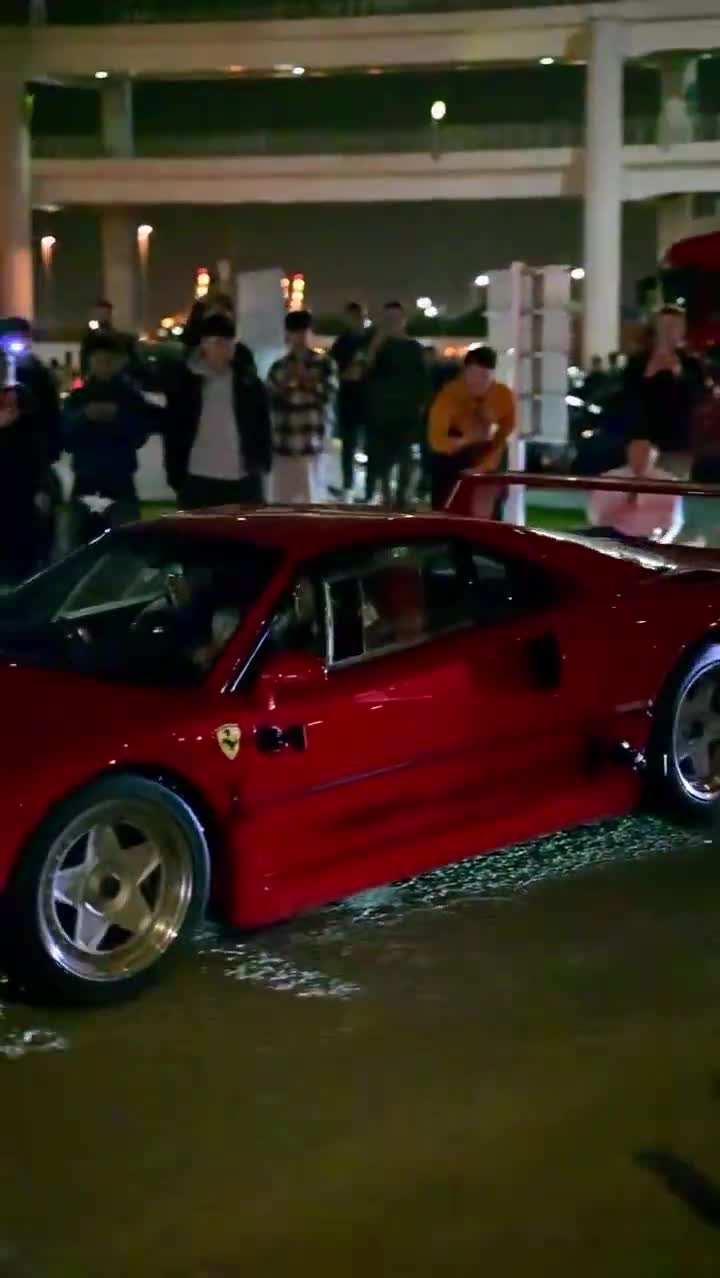 Lewis Hamilton taking the F40 for a spin in Tokyo