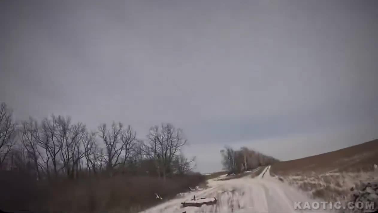 Soldier shoots drone while in back of truck