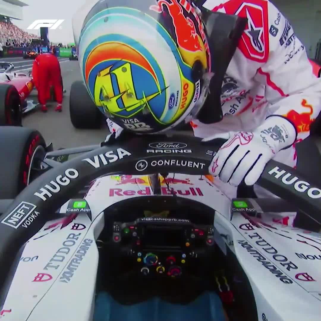 Arvid Lindblad patting and thanking his car after qualifying