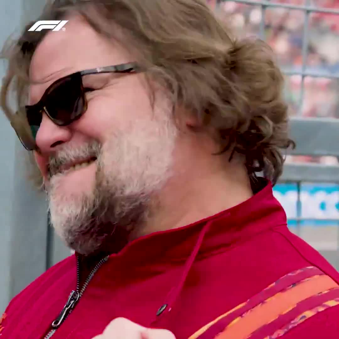 Jack Black rockin' the chequered flag wave