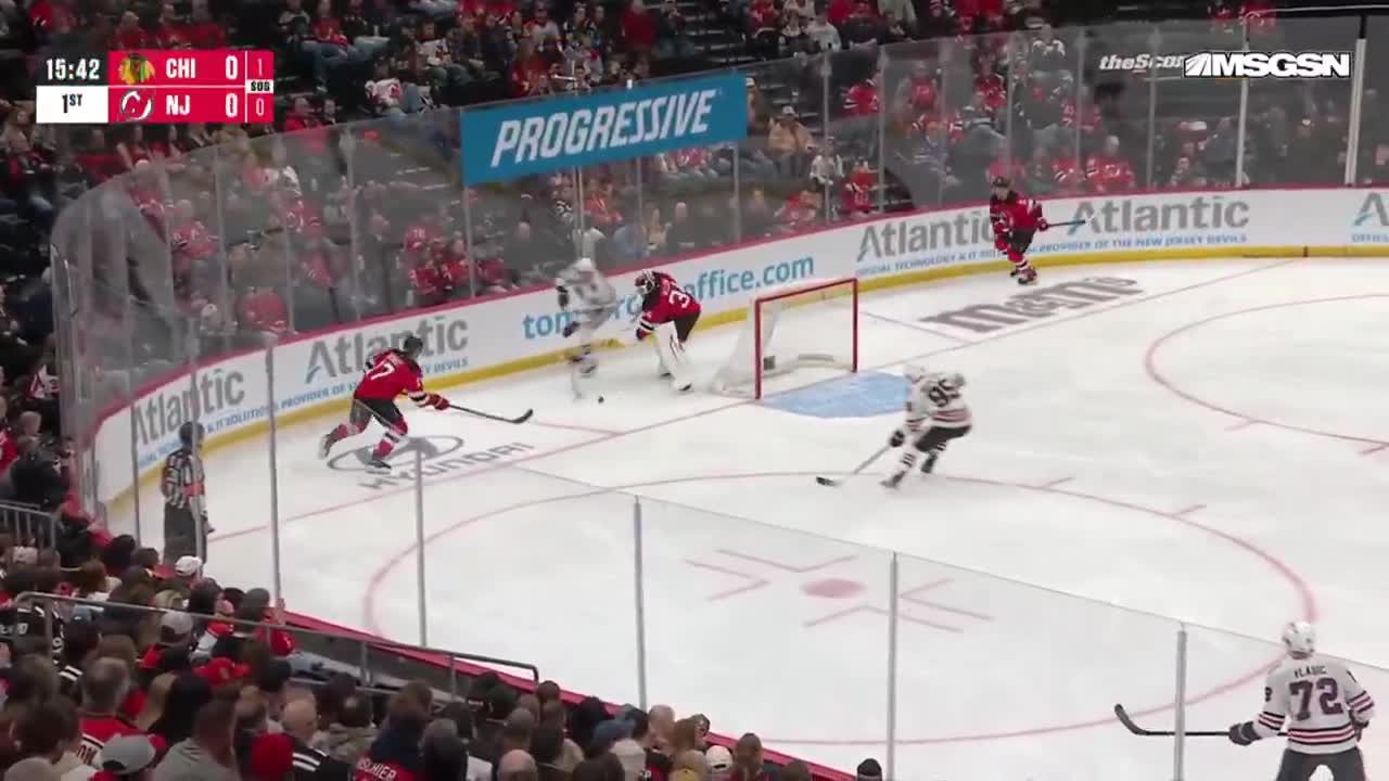 Jake Allen makes an error, leading to a Hawks goal.