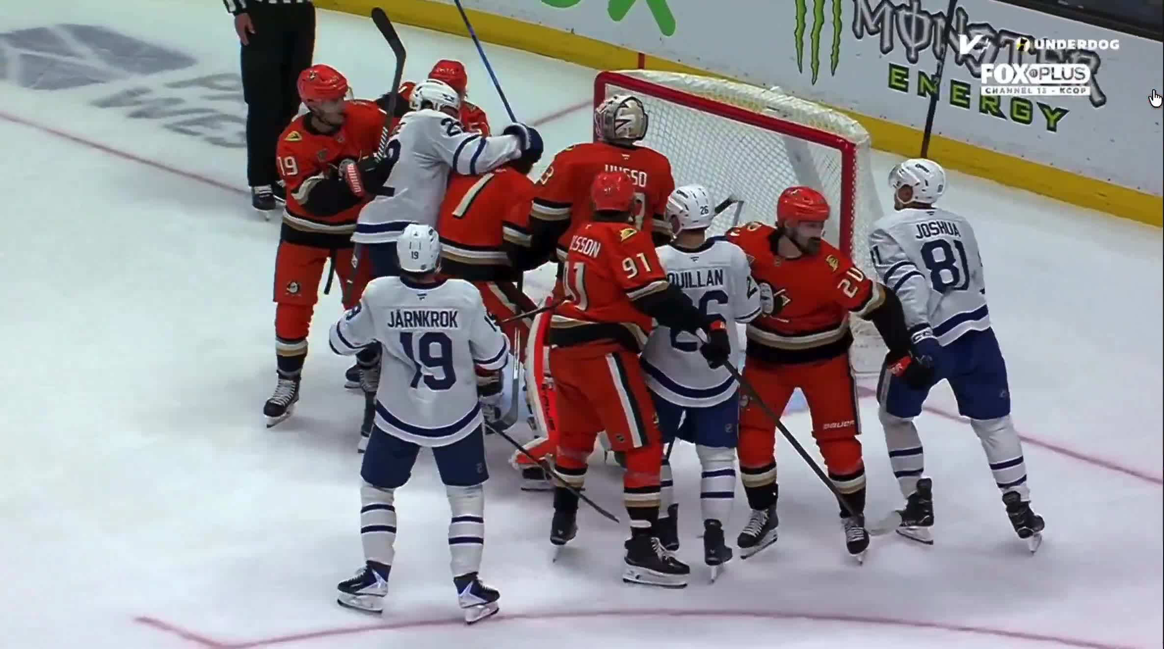 Jake McCabe goes after Radko Gudas looking to get his licks in
