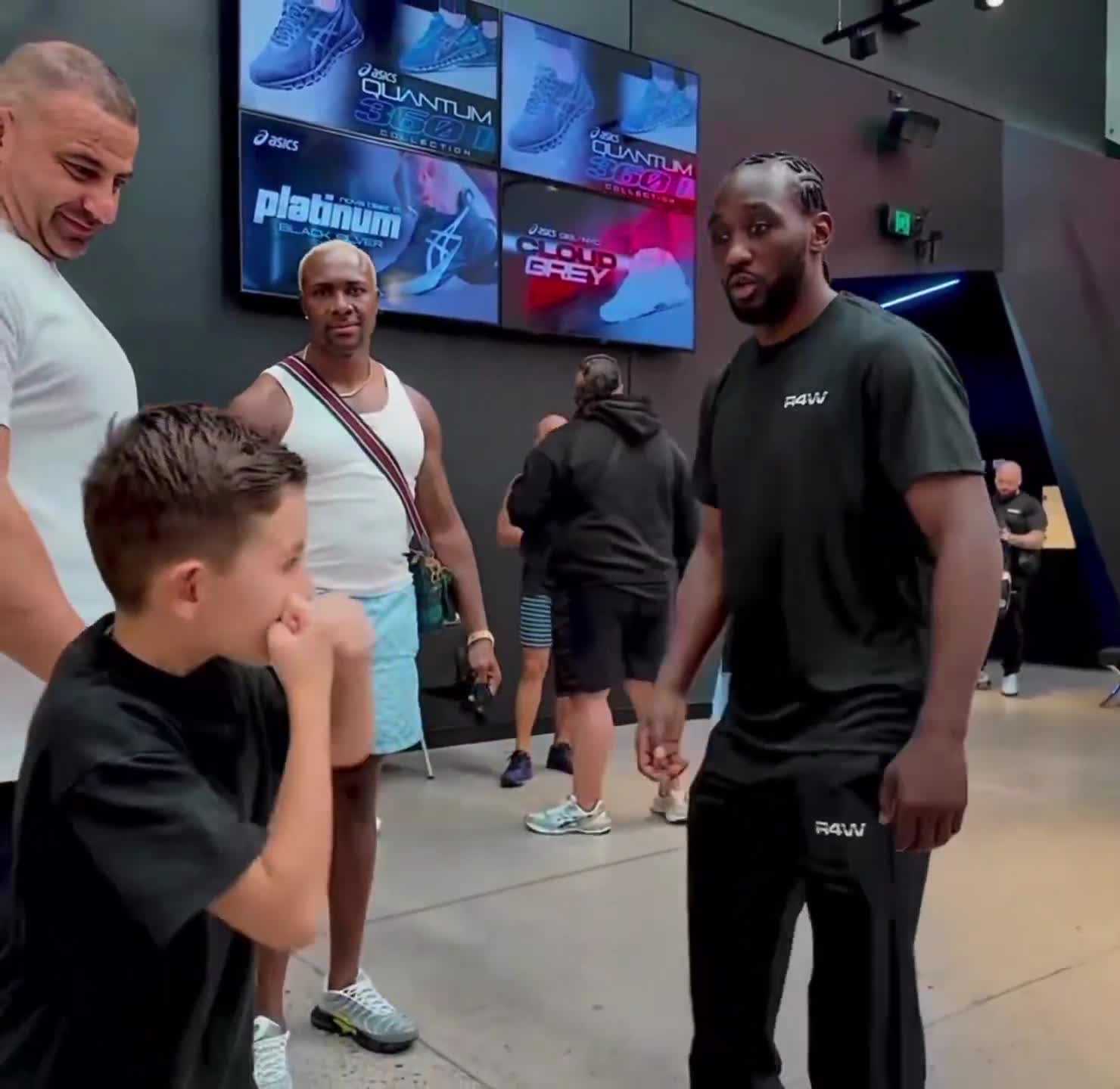 Terence Crawford teaching a young boxer