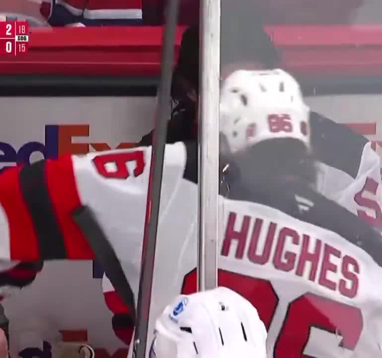 Jack Hughes shows his appreciation to Brenden Dillon after Dillon stood up for him following a hit.