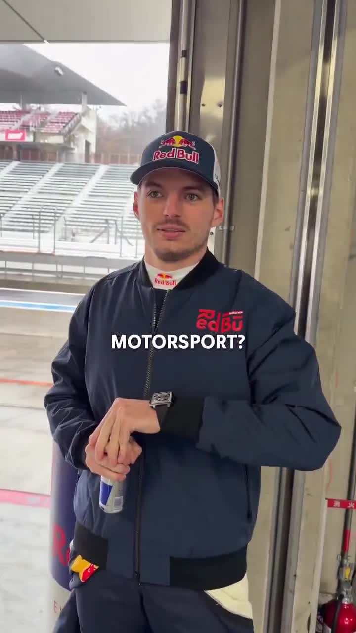 Max giving advices for young drivers while opening the red bull can